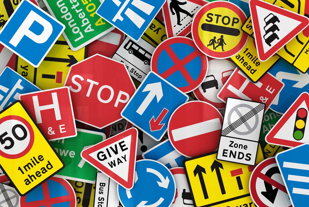 Driving Regulations in TT: Guide to Road Rules, Tests & Permits